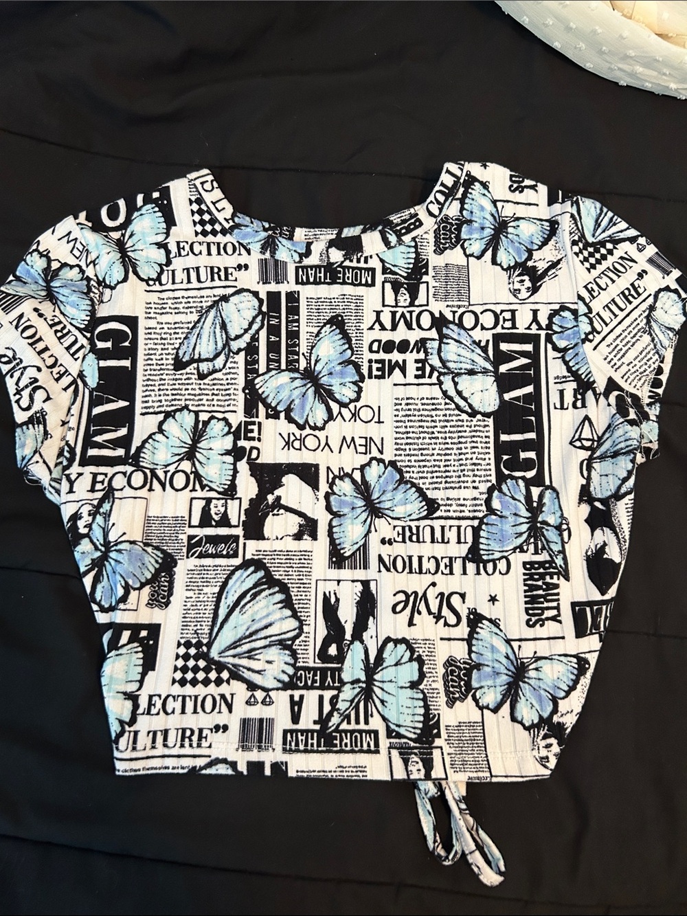 Women’s White Newspaper Print Top with Blue Butterfly Motif